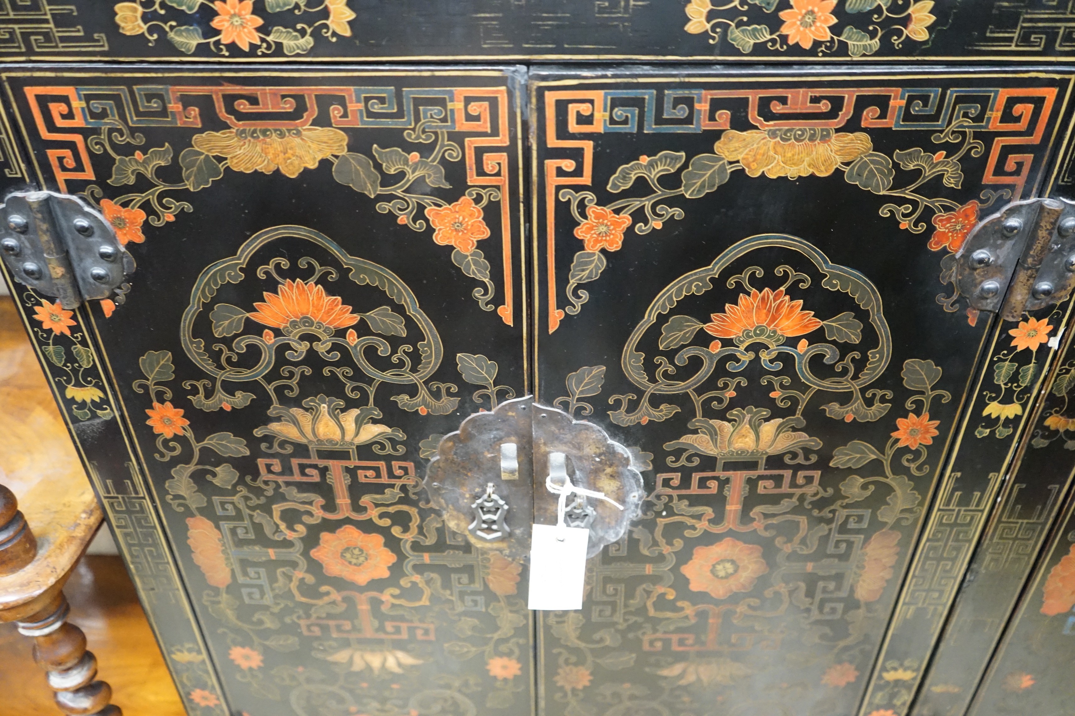 A pair of Chinese painted two door side cabinets, width 61cm, depth 31cm, height 93cm